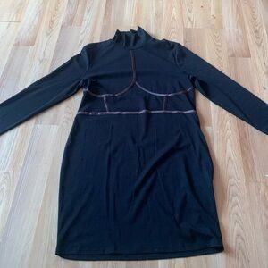 This is a black long sleeve dress